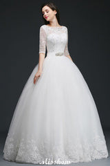 This elegant Jewel Tulle wedding dress with Appliques could be custom made in plus size for curvy women. Plus size Half-Sleeves Ball Gown bridal gowns are classic yet cheap.