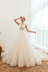 This elegant V-neck,Spaghetti Straps Tulle wedding dress with Lace,Beading,Pearls could be custom made in plus size for curvy women. Plus size Sleeveless A-line,Ball Gown bridal gowns are classic yet cheap.