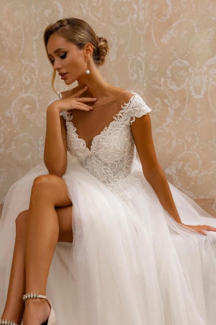 Designer A-Line Tulle Lace V-Neck Sleeveless White Wedding Dress With Appliques