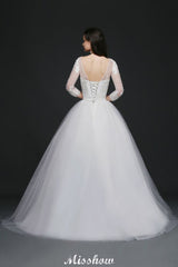 This elegant Scoop Tulle wedding dress with Lace could be custom made in plus size for curvy women. Plus size 3/4-Length Sleeves Ball Gown bridal gowns are classic yet cheap.