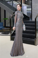 The gorgeous Luxury Sparkly beading High Neck Sheer Tulle Long Prom Dress will stun every girl. The Tulle Vintage Party dress will add extra elegance to your wholesale look.