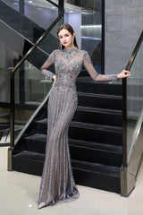 The gorgeous Luxury Sparkly beading High Neck Sheer Tulle Long Prom Dress will stun every girl. The Tulle Vintage Party dress will add extra elegance to your wholesale look.