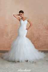 This elegant V-neck Tulle wedding dress with Beading,Sequined could be custom made in plus size for curvy women. Plus size Sleeveless Mermaid bridal gowns are classic yet cheap.