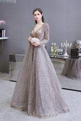 Looking for Prom Dresses,Evening Dresses,Homecoming Dresses,Quinceanera dresses in Tulle,Lace, A-line style, and Gorgeous Draped,Pearls,Sequined,Rhinestone work  MISSHOW has all covered on this elegant Modest Long Sleeves V-Neck Princess Prom Dress Sequined Aline Party Gown.