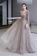 Looking for Prom Dresses,Evening Dresses,Homecoming Dresses,Quinceanera dresses in Tulle,Lace, A-line style, and Gorgeous Draped,Pearls,Sequined,Rhinestone work  MISSHOW has all covered on this elegant Modest Long Sleeves V-Neck Princess Prom Dress Sequined Aline Party Gown.