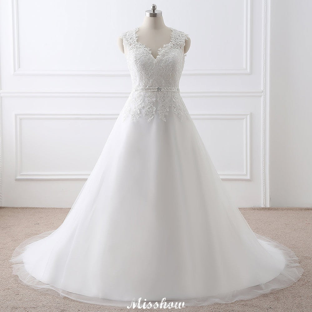 This elegant V-neck Tulle wedding dress with Lace could be custom made in plus size for curvy women. Plus size Sleeveless Princess bridal gowns are classic yet cheap.