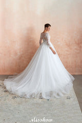 Looking for  in Tulle, A-line,Ball Gown,Princess style, and Gorgeous Lace work  MISSHOW has all covered on this elegant Romantic Long Sleeve Lace Ball Gown Tulle Fully Covered Buttons Aline Wedding Dress with Court Train