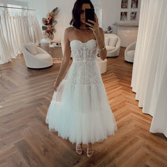 Find this Chic Deep V-neck White Wedding Dressat Misshow, available in everyone color and size you could possibly imagine, which makes picking out the perfect prom dress for your big day easily!