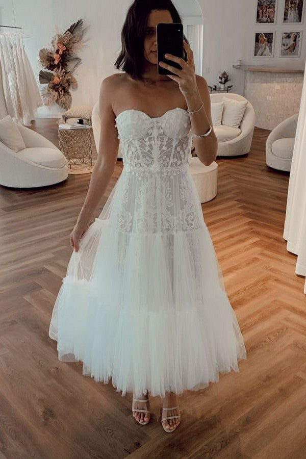 Find this Chic Deep V-neck White Wedding Dressat Misshow, available in everyone color and size you could possibly imagine, which makes picking out the perfect prom dress for your big day easily!