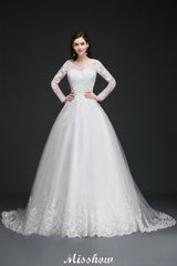 This elegant V-neck Tulle wedding dress with Appliques could be custom made in plus size for curvy women. Plus size Long Sleeves Ball Gown bridal gowns are classic yet cheap.