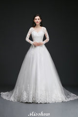 This elegant V-neck Tulle wedding dress with Appliques could be custom made in plus size for curvy women. Plus size Long Sleeves Ball Gown bridal gowns are classic yet cheap.