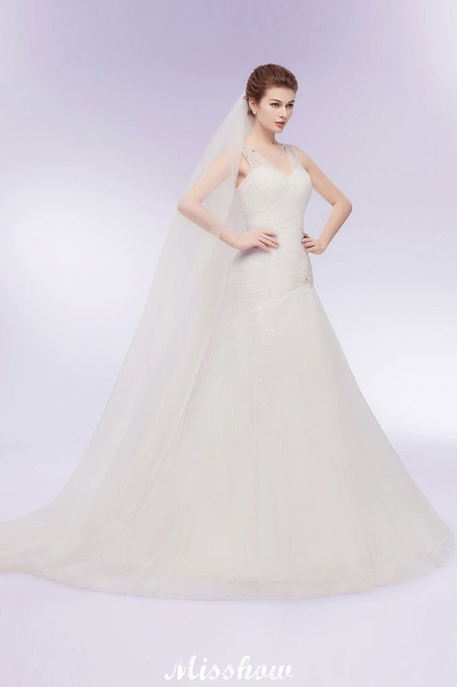 This beautiful V-neck Floor Length Mermaid Crystals Tulle Wedding Dresses will make your guests say wow. The V-neck bodice is thoughtfully lined, and the Floor-length skirt with Crystal,Ruffles,Ruched to provide the airy, flatter look of Tulle.